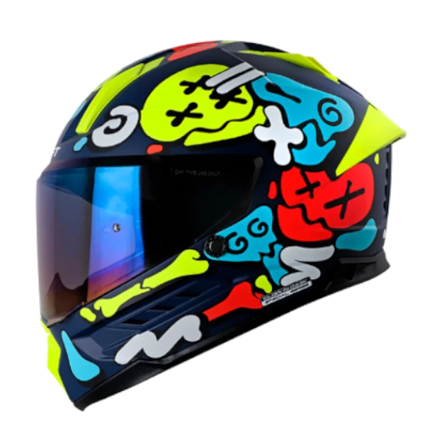Casco integral SHAFT 595 Glowing Bones Azul Amarillo con diseño calavera que brilla en la oscuridad, visor antirrayas y ventilación avanzada.